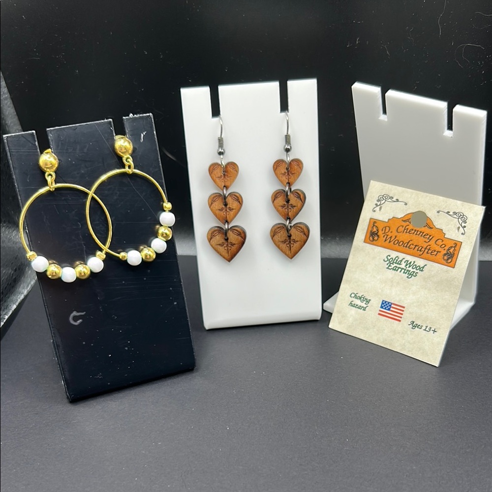 2 pair of earrings. Solid wood heart dangle & gold tone with gold & white beads.